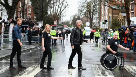 Reuters Prince Harry, Bon Jovi and two members of the Invictus Games Choir recreated the famous Beatles album cover