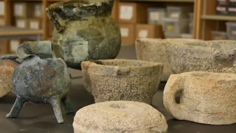 Bournemouth University Cauldrons, cups, pottery and kitchen objects from the wreck