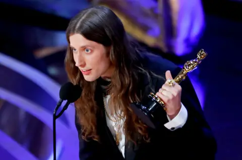 Reuters Ludwig Goransson accepts the Best Original Score award for "Black Panther"