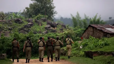 Getty Images Police patrol on the look-out for anti-mining activists in Meghalaya.