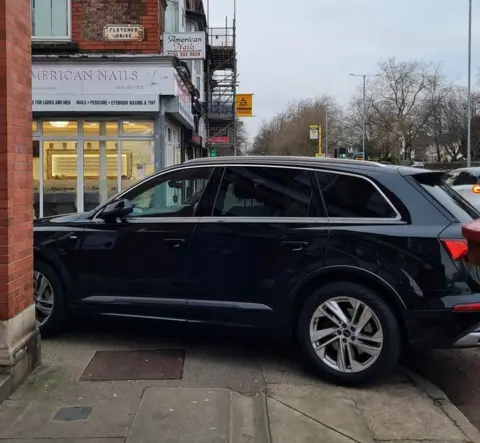 Richard Clein Car parked on pavement
