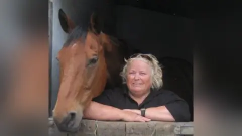 family photo A woman found dead in Swansea has been named as Wendy Buckney