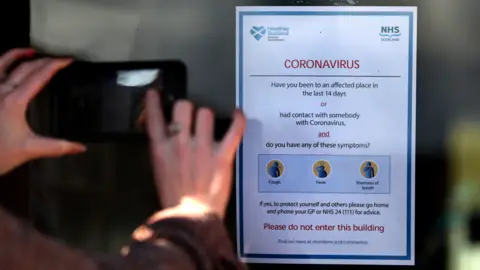 PA Media coronavirus sign