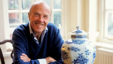 Vivienne Foley Sir Michael Butler with one of his pots in 2010