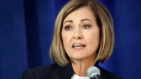 Reuters Republican Iowa Governor Kim Reynolds speaks at the Iowa State Fairgrounds in Des Moines, Iowa, U.S., October 1, 2022.