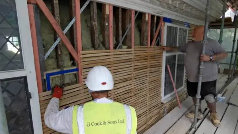 The Construction Team Nigel Davies (right in photo) is Master Plasterer for G Cook and Sons Ltd and relished the opportunity to work on the historic Unitarian Meeting House