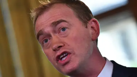 Getty Images Liberal Democrat leader Tim Farron speaks during a press conference in London on June 9, 2017 following to the results of Britain's snap general election.