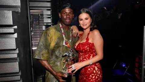 Christopher Polk Rema and Selena Gomez