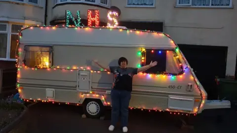 Sarah Link Sarah Link outside the caravan