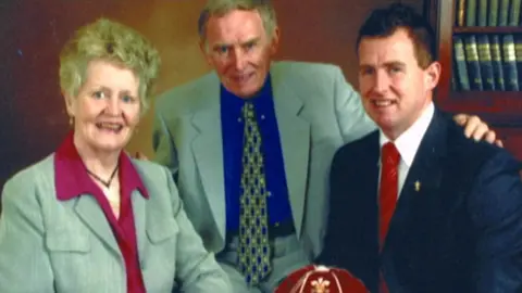 Nigel Owens with his parents