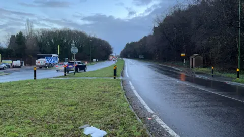 A road on a grey, overcast day. 