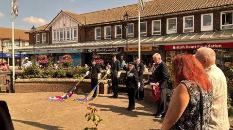 George Carden/BBC Armed forces, veterans and residents gathered at Hailsham town centre to commemorate the 80th anniversary of VJ Day.