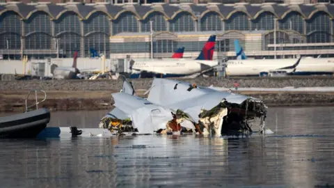 Getty photos of the US Airways plane that crashed outside the Reagan Airport in Washington, DC