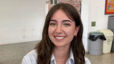 A young woman in a shirt