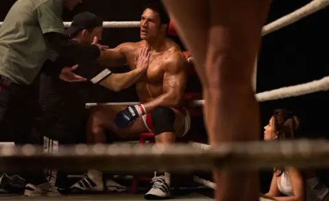 A24 Dwayne Johnson seen in The Smashing Machine as Mark Kerr, pictured in the boxing ring