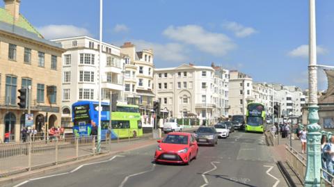 Vehicles driving along Marine Parade, Brighton