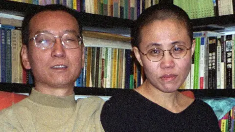 AFP Chinese dissident and Nobel Peace laureate Liu Xiaobo (L) and his wife Liu Xia in Beijing