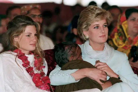 Anwar Hussein/Getty Images Diana, Princess of Wales wears a traditional shalwar khameez as she sits with Jemima Khan during a visit to Imran Khan's cancer hospital in Lahore, Pakistan in April 1996