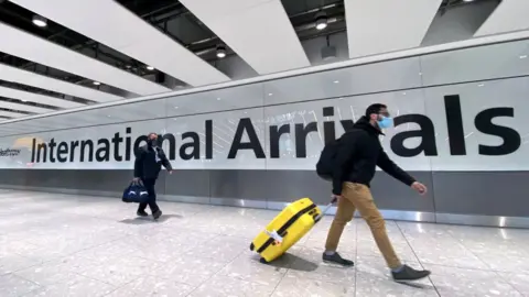 Reuters Passengers at International Arrivals, Heathrow