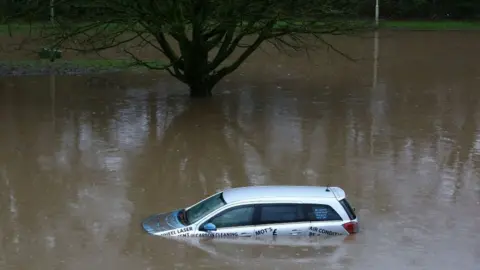 Getty Images Submerged car at Nantgarw following Storm Dennis