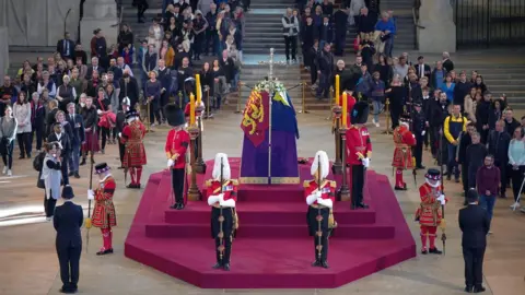 PA Media The Queen lying in state