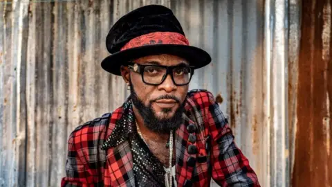 Tariq Zaidi Serge Bakama Boke (aka Jika),