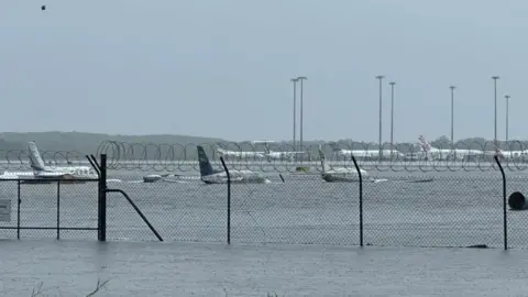 Joseph Dietz Planes submerged at Cairns airport