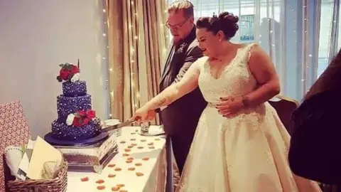 Kathryn Bradfield Cutting the wedding cake