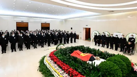 XINHUA Chinese leaders pay their final respects to Jiang Zemin at the Chinese PLA General Hospital in Beijing, China on Monday 5/12