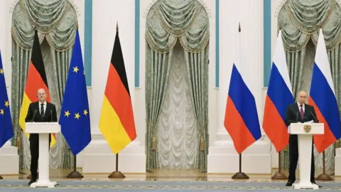 BBC Russian President Vladimir Putin (R) and German Chancellor Olaf Scholz attend a press conference following their meeting over Ukraine security at the Kremlin, in Moscow, on February 15, 2022.