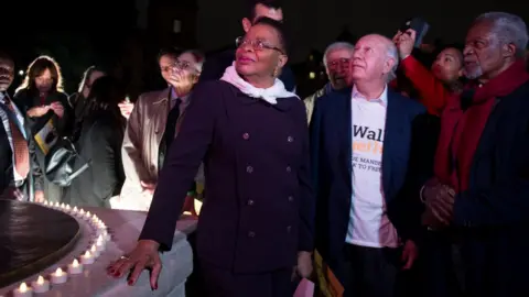 EPA Graca Machel, ex UN Secretary-General Kofi Annan (R) and ex Chile President Ricardo Lagos (C) take part in a Mandela Walk Together event in Westminster, Central London, Britain, 23/10/2017.