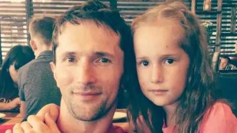 Alexei Achkasov and his daughter, Alisa