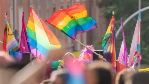 Getty Images pride flags being waved