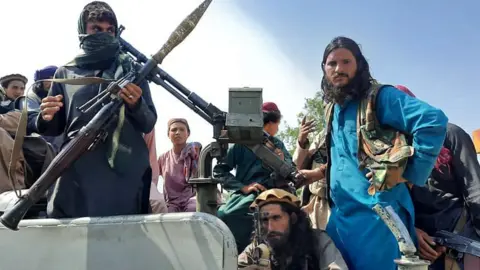 Getty Images Taliban fighters on 15 August