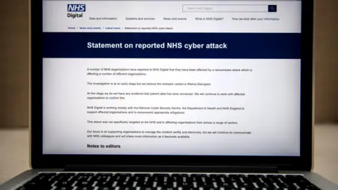 Getty Images NHS Digital statement on a laptop