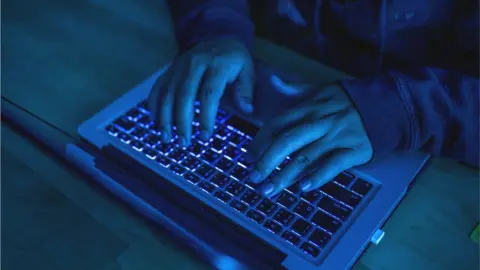 Getty Images Person using laptop