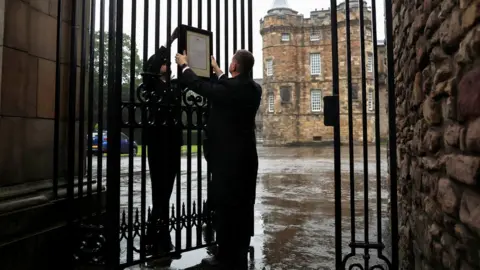 Reuters Notice of Queen's death being posted on palace gates