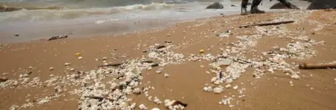 HM Coastguard Palm oil deposits on beach