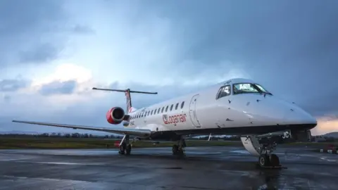 Loganair A Loganair plane stands at an airport