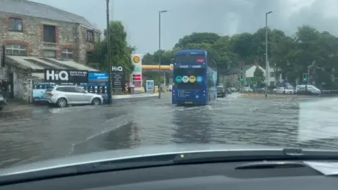 Oliver Dobbs Flooding on a roundabout in Truro, Cornwall