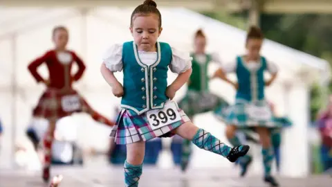 Dancers compete during the Inveraray Highland Games on July 18, 2023 in Inveraray, Scotland.