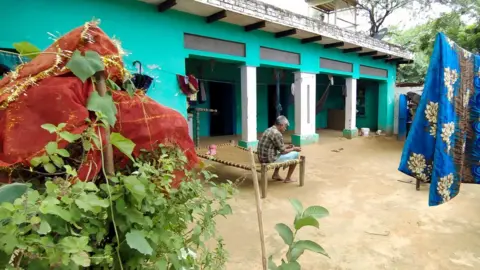 Abhishek Mathur The victim's father and the holy basil plant