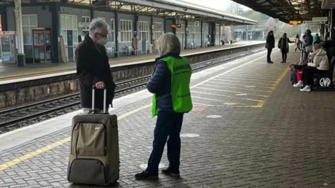 GWR Samaritans volunteer talking to passenger