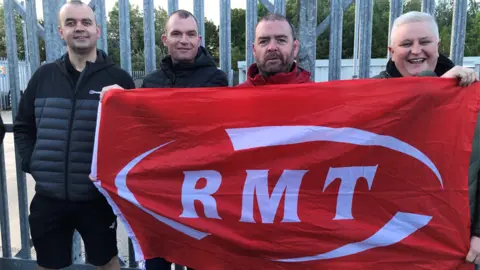 Union members outside the Network Rail depot at Llandudno Junction