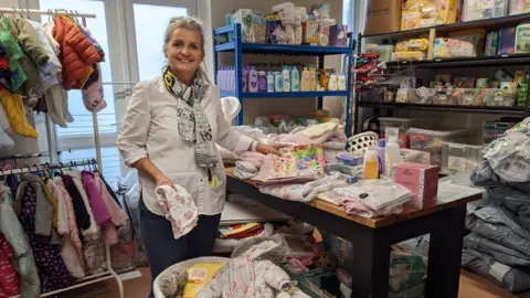 BBC Debbie Hughes at the charity's storage depot