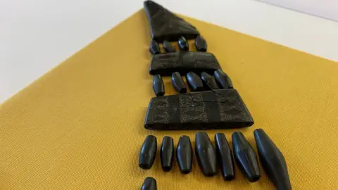 BBC Bead in the from of half the necklace