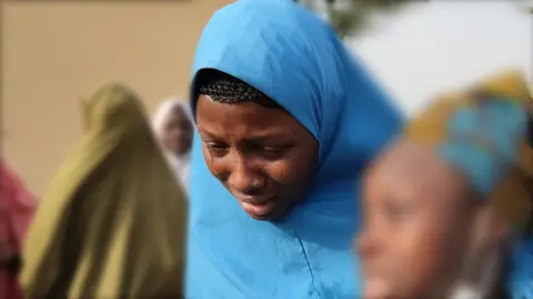 AFP A mother in tears of one the girls kidnapped in Zamfara state in March 2021 - Nigeria