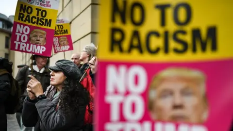 Getty Images Protesters outside the EICC