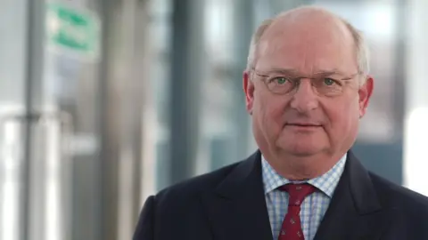 John Fairhall/BBC Councillor Andrew Reid