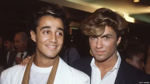 Getty Images There has been a campaign by Andrew Ridgeley (l) to get Wham's Last Christmas to number one this year